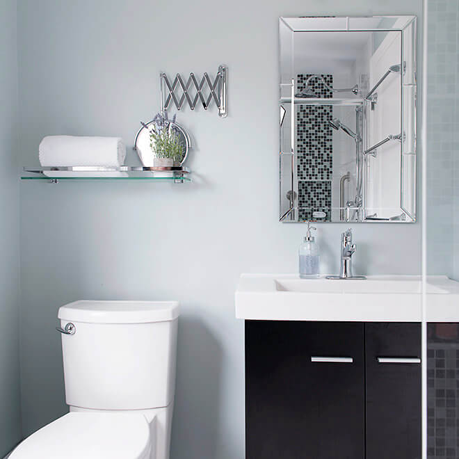 Accessibility bathroom with vanity, vessel sink and glass shelf