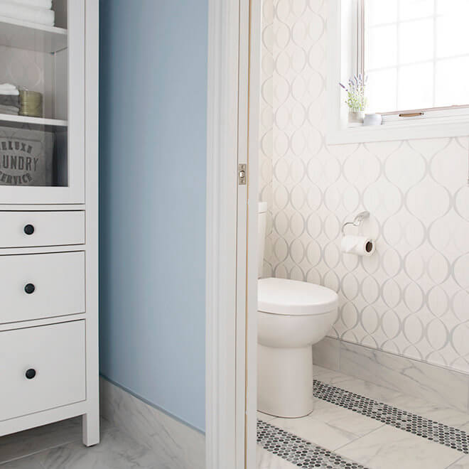 bathroom with marble tile fireplace tv soaker tub